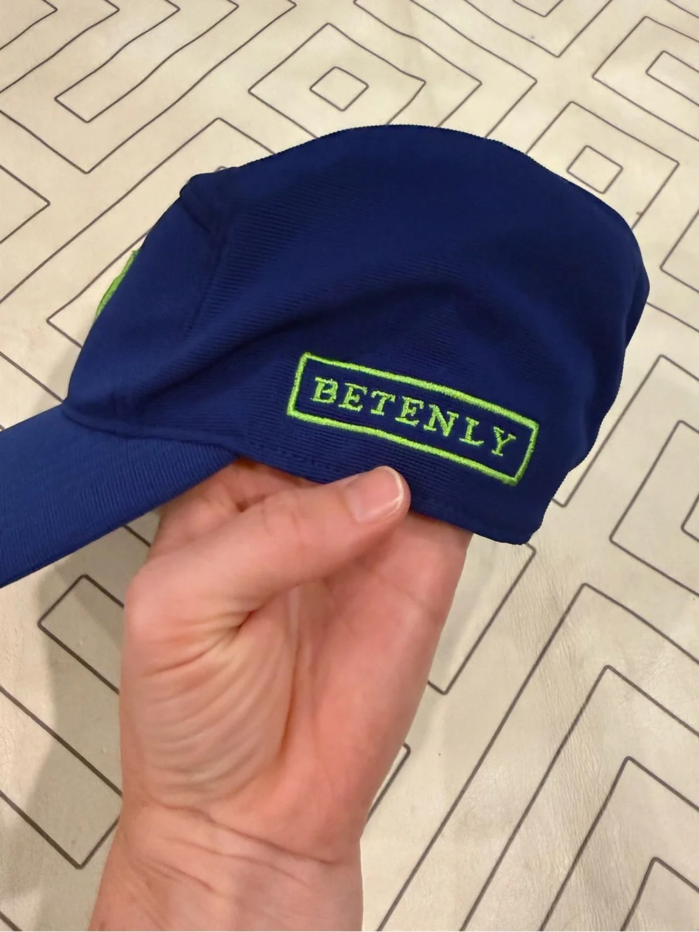 Betenly Blue Athletic Cap with Neon Green Knot Logo